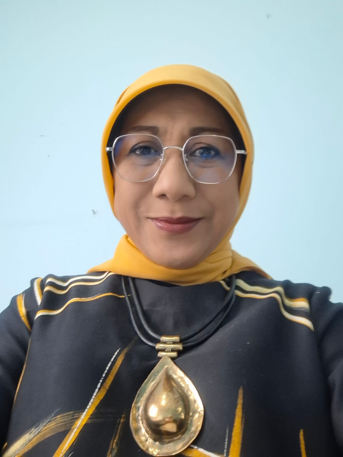 Dr. Tjahjani Natriana, SPS